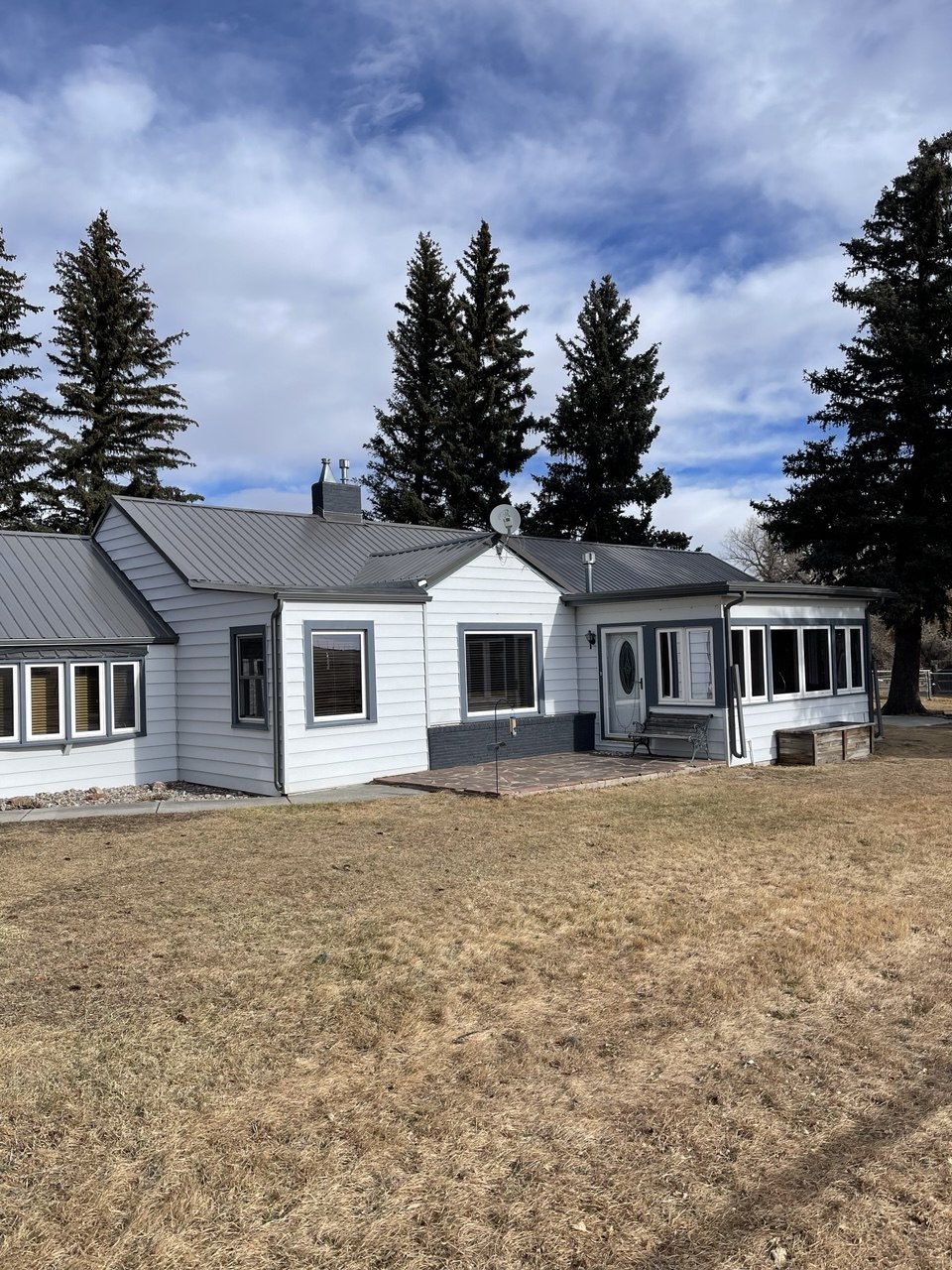 Finished gray metal roof on James Smith's home